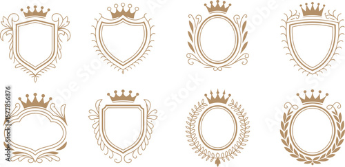 Collection of ornate golden shields and oval frames with crowns and decorative elements