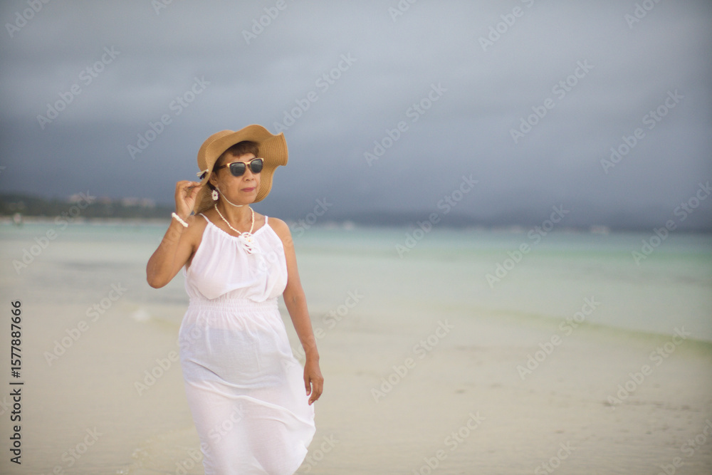 woman on the beach in summer woman on the beach in summer