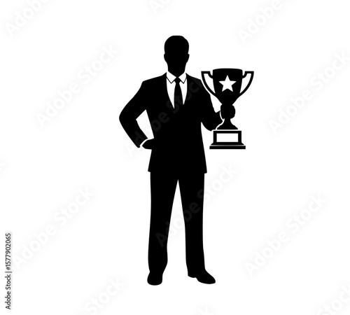 Confident businessman holding trophy in victory stance