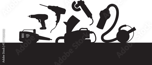 Black power tools and watering can drills sander