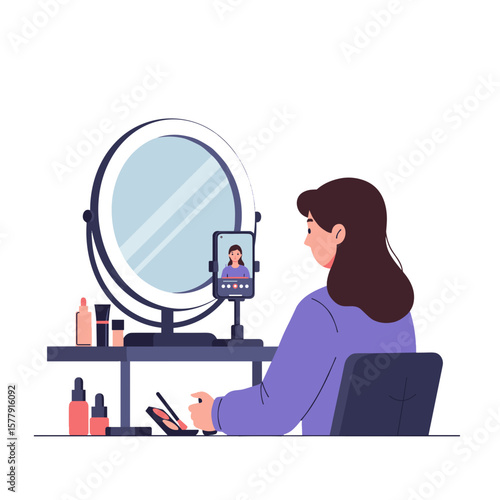 A woman is applying makeup in front of a mirror with a phone recording her in a well lit environment