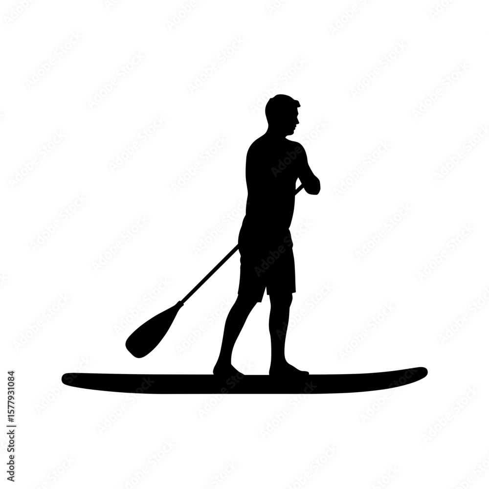 Fototapeta premium Silhouette of a man paddleboarding on calm water during sunset