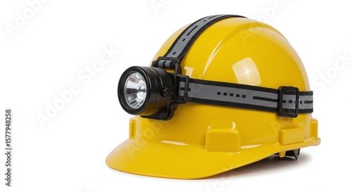 Yellow safety helmet with attached headlamp isolated on a clean white background, safety equipment concept