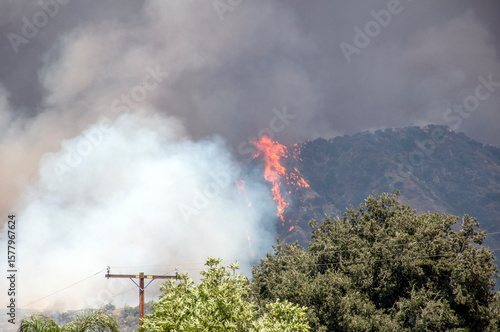 Hillside brushfire and smoke
