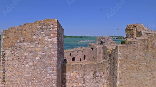 Exploring the historic Smederevo fortress on the danube river in Serbia under clear blue skies