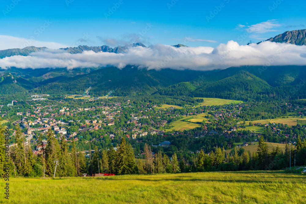 Fototapeta premium View of Tatra Mountains and the town on top of Gubalowka, a hill in Zakopane, Poland