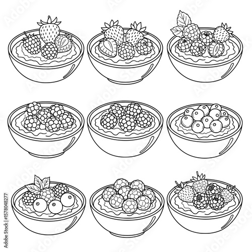 Set of nine bowls filled with berries and fruit slices