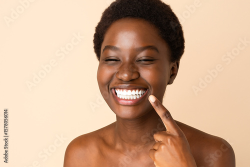 woman showing her white teeth while smiling