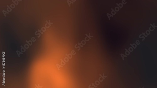 Blurry orange and brown gradient background suitable for web banners, social media posts, digital design projects, and autumn themed designs.