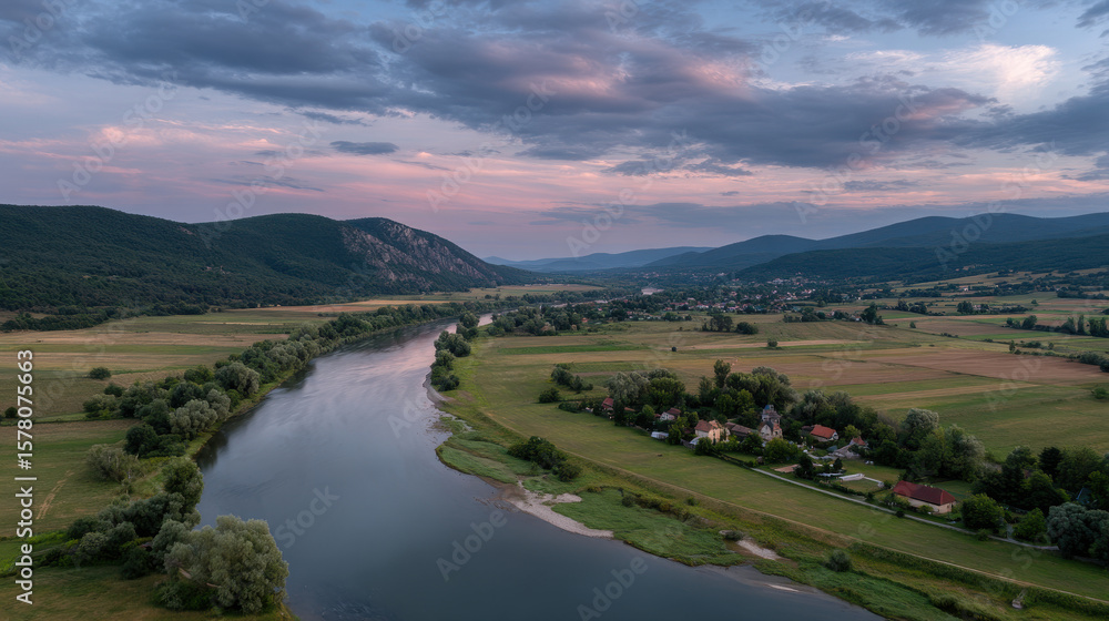 Obraz premium stunning aerial view serene beauty of rural landscapes in eastern europe showcasing lush green fields meandering