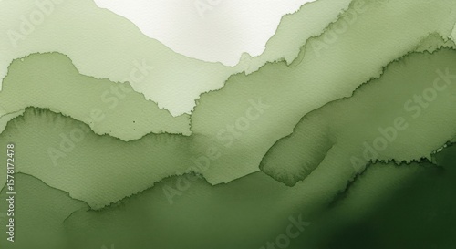 Abstract watercolor layers of green paint creating a serene organic landscape background
