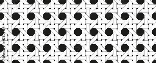 Rattan pattern on black background. Horizontal wicker geometric black and white lattice weave pattern. Rattan decoration pattern.