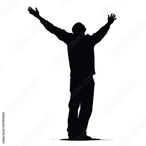 Silhouette of Person with Arms Raised in Dark Against White Backdrop Expressing Freedom