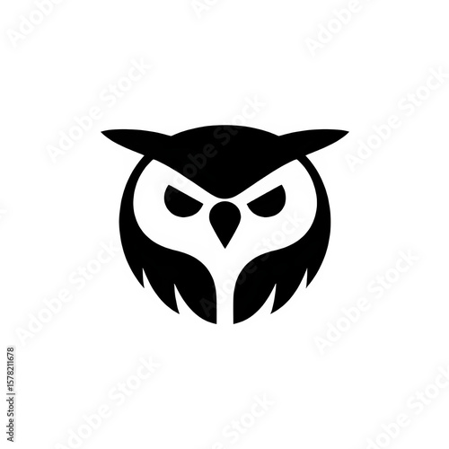  A black owl head logo with sharp features and piercing eyes