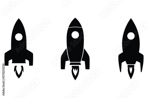 variety of rocket silhouette  in black, featuring cartoon-style vertical spacecraft on white background