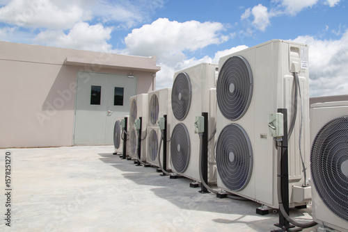 Fotografie Air conditioning outdoor unit compressor install outside the building
