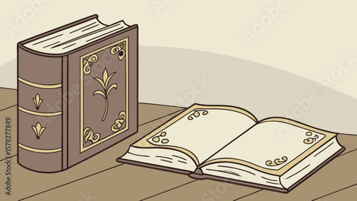 Two books on a wooden surface one closed and standing the other open with blank pages and decorative borders