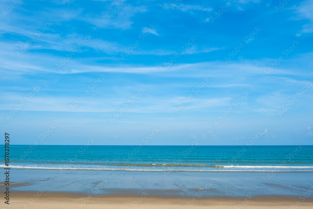 Nature of the ocean and blue sky Summer with sunshine, sandy beaches, clear blue waters sparkling against the blue sky. on an island with good ecology and environment Background for summer vacation Nature of the ocean and blue sky Summer with sunshine, sandy beaches, clear blue waters sparkling against the blue sky. on an island with good ecology and environment Background for summer vacation