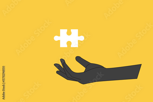 Businessman holding a jigsaw puzzle piece. concept of Problem solving, Strategy