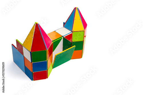 Castle front with gate and high towers made from plastic magnetic tiles, high view, isolated on white background Free Download Castle front with gate and high towers made from plastic magnetic tiles, high view, isolated on white background - GFXLoad