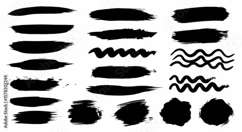 Black brush strokes and blots with wave shapes on a white background