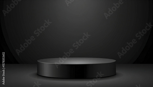 Black round podium on dark background with soft lighting for product display
