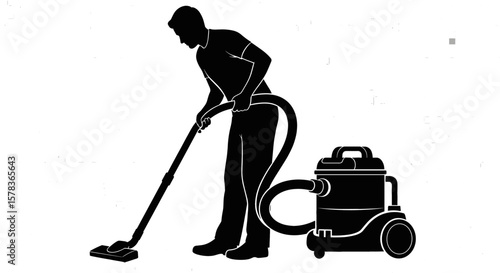 Man vacuums with canister vacuum. Home cleaning, domestic work, house chore, hygiene