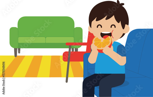 A smiling child happily eating a slice of orange fruit while sitting on a blue couch.