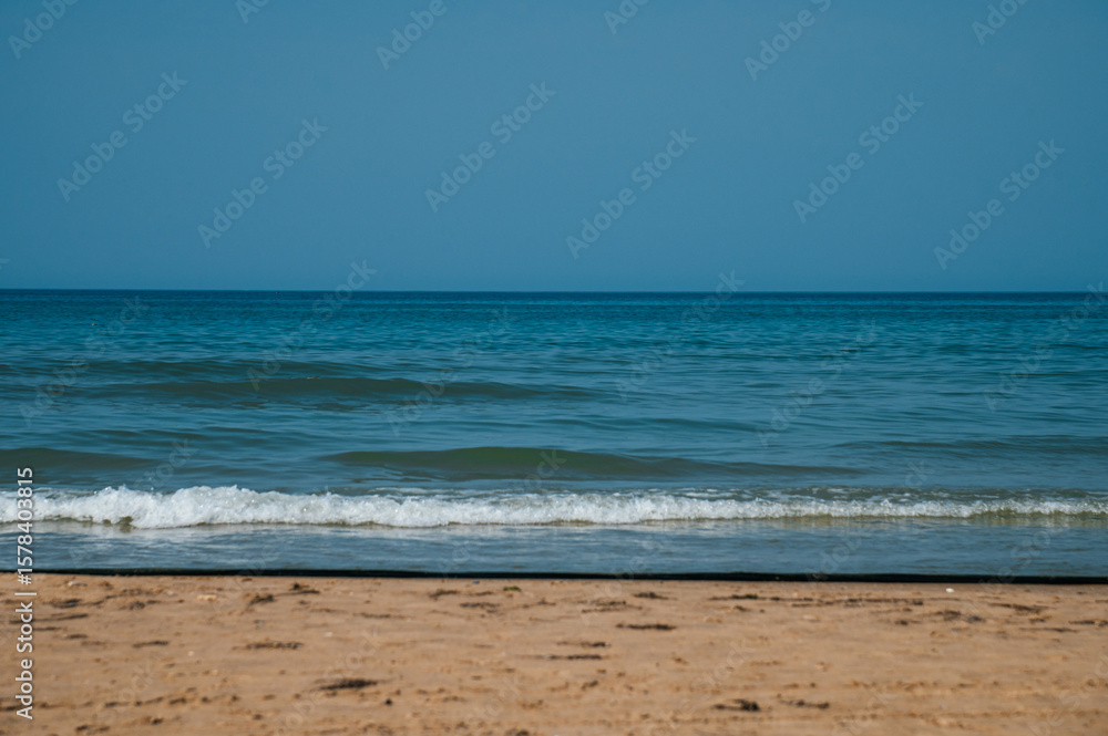 the sandy seashore in Anapa after the oil spill in the Black Sea the sandy seashore in Anapa after the oil spill in the Black Sea