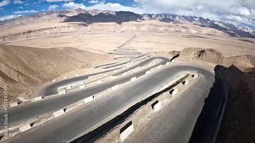 Panlong Ancient Road in Xinjiang, China – Aerial View of Winding Mountain Highway Like a Dragon Super fast video
