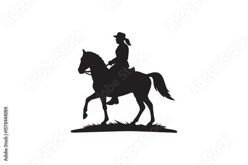 Silhouette of a Cowgirl Riding a Horse Across a Field
