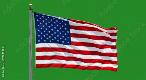 Wallpaper Mural American flag waving on a flagpole against a green screen background in a patriotic display of freedom Torontodigital.ca