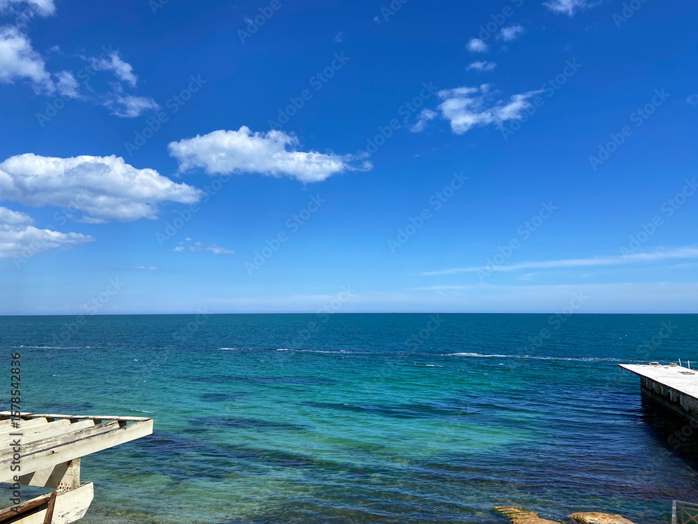 Fototapeta premium An unsurpassed natural picture of numerous shades of sea blue on the Black Sea coast in late spring.