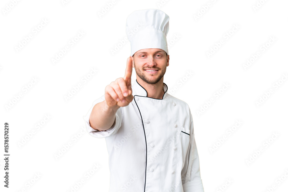 Young caucasian chef over isolated chroma key background showing and lifting a finger Young caucasian chef over isolated chroma key background showing and lifting a finger