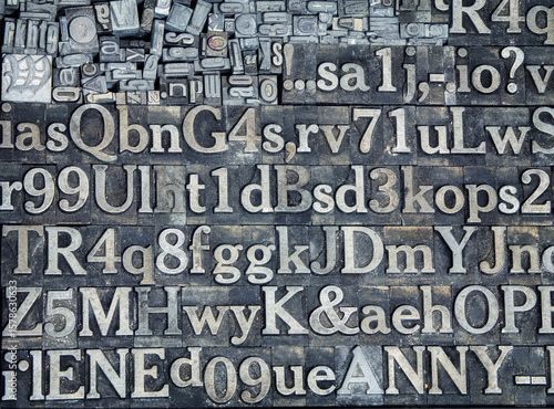 Fototapete Vintage letterpress printing blocks with letters, numbers, and symbols