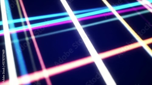 Colorful neon light streaks move across a dark blue background creating a grid pattern