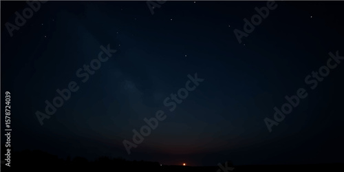 Night Sky with faint Milky Way: A tranquil night sky scene featuring a faint Milky Way, scattered stars, and a distant horizon glow.  