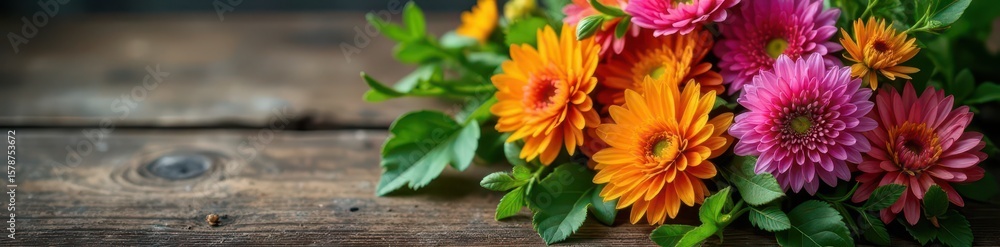 Fototapeta premium A bouquet of colorful edible flowers on a wooden table , herbs, edible flowers