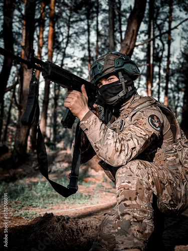 A soldier with a machine gun