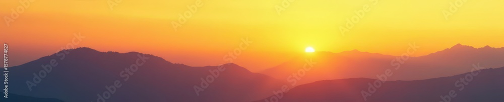 Fototapeta premium Gradient sky at sunset fades into misty mountains landscape abstract yellow, mountains, sunsets, foggy landscape