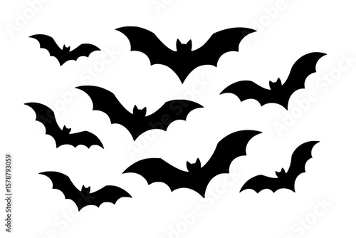 Silhouettes of Bats in Flight Against a white background