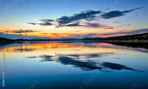 Wallpaper Mural Serene Sunset Reflection Over Calm Waters with Wooden Dock and Majestic Mountains in the Background Torontodigital.ca