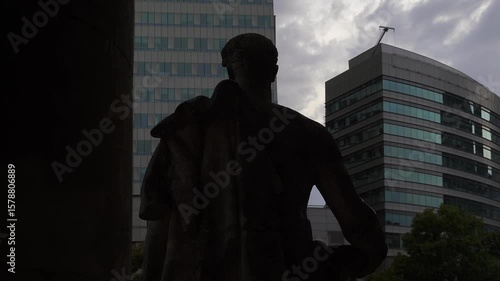 A 1955 Soviet city is viewed from behind a person, offering a close-up perspective on the era's architecture and atmosphere. Soviet Union, USSR, 1955, city, view, architecture, old, culture, history, 