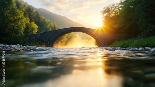 Sunrise over mountain river bridge