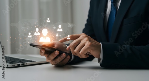 Wallpaper Mural Business Man Using Smartphone with Network Connection and World Map Overlay Torontodigital.ca