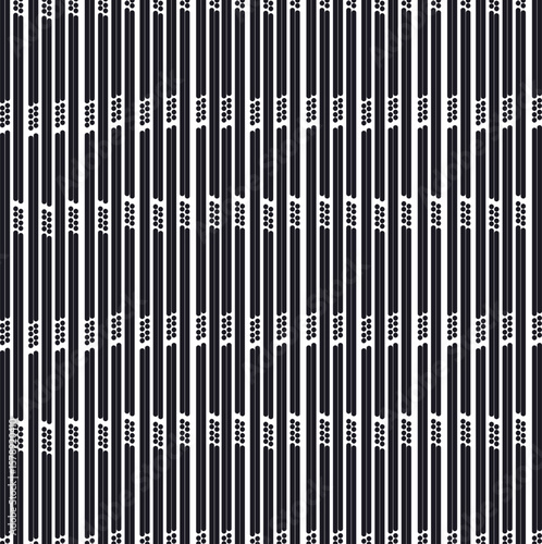 The texture consists of vertical stripes and dots, which from a distance resemble the stripes of blinds.