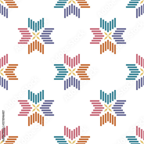 Abstract ethnic flower or snowflake seamless pattern.Ikat textile texture in Bohemian, Mexican,African, mediterranean style.Nordic folk art background.Design for happy holiday,nature winter,Christmas.