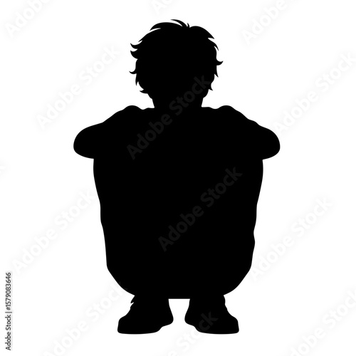 Lonely boy hugging knees silhouette — School bullying and isolation concept