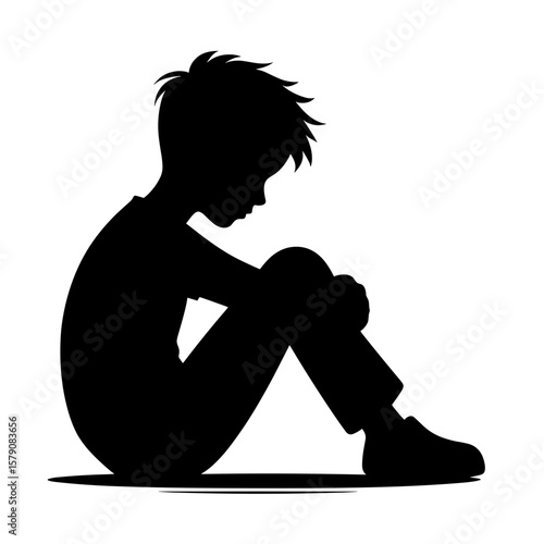 Sad boy sitting with head down silhouette — Concept of school bullying victim