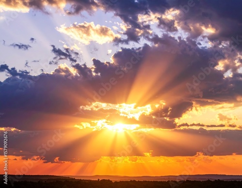 Dramatic sunset through clouds